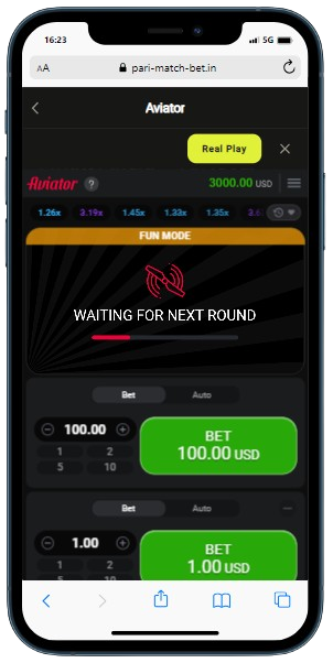 A smartphone displaying Aviator demo mode with betting options and button 'Real play'